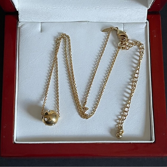 Avon Jewelry - Avon gold tone ball with rhinestone Necklace.